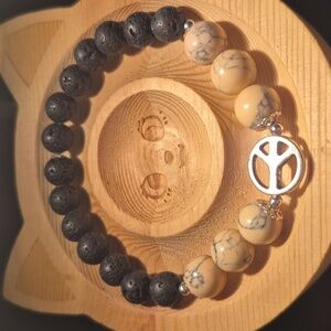 Pink magnesite with peace sign and lava beads